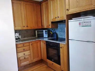 Una cocina o zona de cocina en Dúplex familiar en Esterri d'Àneu