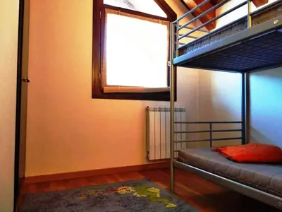 Cama o camas de una habitación en Dúplex familiar en Esterri d'Àneu