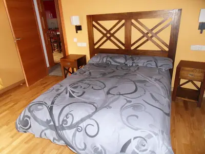 Cama o camas de una habitación en Pensió i Apartaments la Bordeta