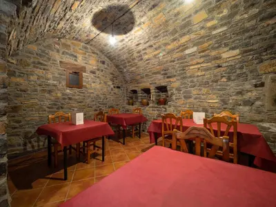 Un restaurante o sitio para comer en Apartamento Casa Dueso