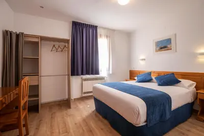 Cama o camas de una habitación en Hotel Marxant