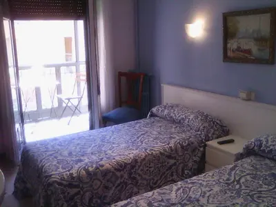 Cama o camas de una habitación en Hostel Central Zaragoza