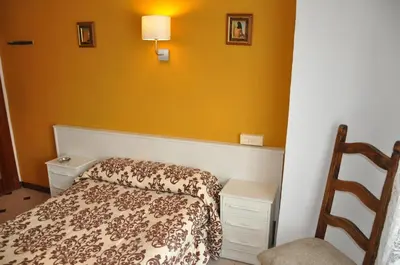 Cama o camas de una habitación en Hostel Central Zaragoza