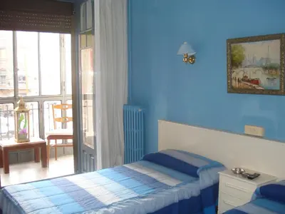 Cama o camas de una habitación en Hostel Central Zaragoza