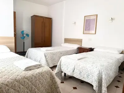 Cama o camas de una habitación en Hostel Central Zaragoza