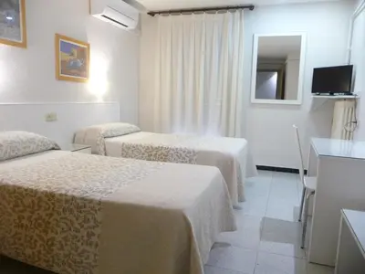 Cama o camas de una habitación en Hotel Goya