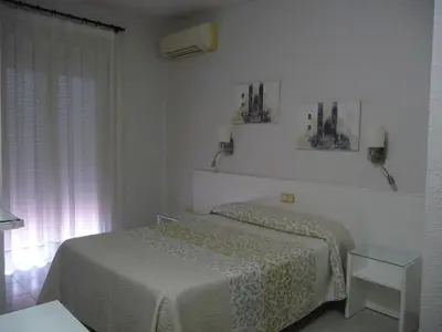 Cama o camas de una habitación en Hotel Goya