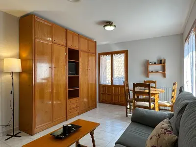 Zona de estar de Apartamentos Lausan