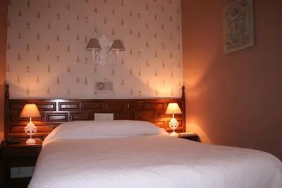 Cama o camas de una habitación en Hotel Boutique Balaitus