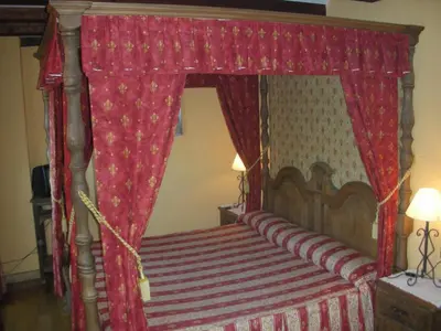 Cama o camas de una habitación en Hotel Posada Real