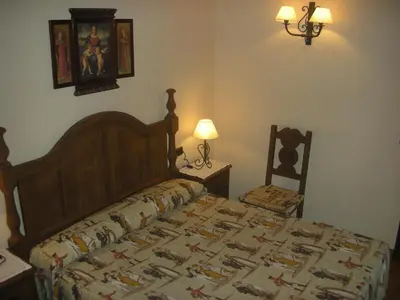 Cama o camas de una habitación en Hotel Posada Real