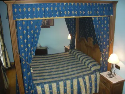 Cama o camas de una habitación en Hotel Posada Real