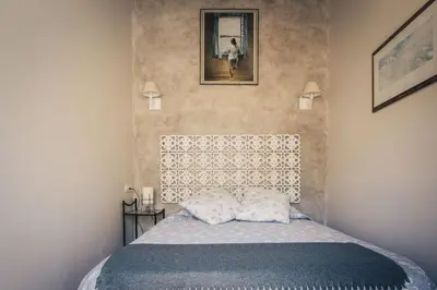 Cama o camas de una habitación en Casa Ferran, amplias habitaciones y apartamentos de montaña