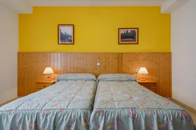 Cama o camas de una habitación en Hostal Kimboa