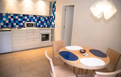 Una cocina o zona de cocina en Apartamentos Bergantes