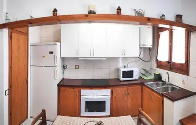Una cocina o zona de cocina en EVA & TRAVEL - Cal Marcel Prades