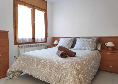 Cama o camas de una habitación en EVA & TRAVEL - Cal Marcel Prades