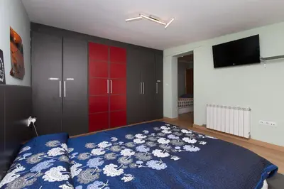 Cama o camas de una habitación en Casa Gratal (Siétamo, Huesca)