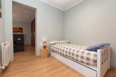 Cama o camas de una habitación en Casa Gratal (Siétamo, Huesca)