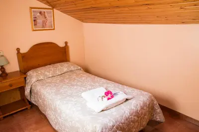Cama o camas de una habitación en Apartamentos Casa Ruben