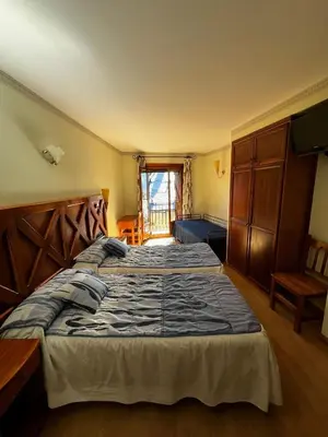 Cama o camas de una habitación en CASA PELENTOS Sandinies