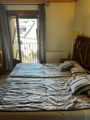 Cama o camas de una habitación en CASA PELENTOS Sandinies