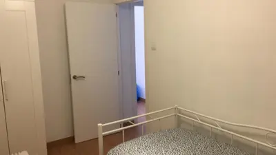 Cama o camas de una habitación en Apartamento Huesca en Paseo Ramón y Cajal