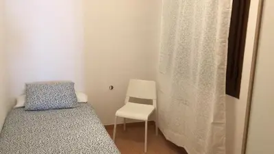 Cama o camas de una habitación en Apartamento Huesca en Paseo Ramón y Cajal