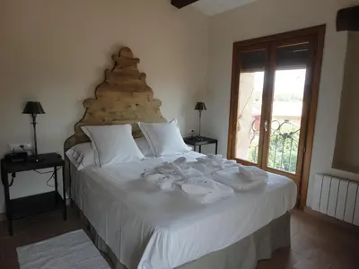 Cama o camas de una habitación en Hotel Rural Cal Torner Adults Only