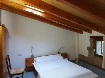 Cama o camas de una habitación en Masia l`Arà