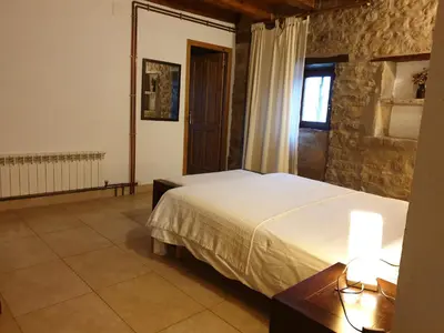 Cama o camas de una habitación en Masia l`Arà