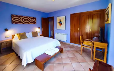 Cama o camas de una habitación en Hotel Rural LAbadia de Sieste