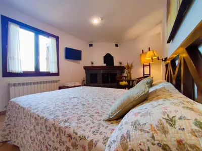 Cama o camas de una habitación en Hotel Rural LAbadia de Sieste
