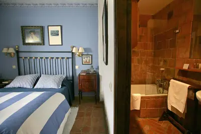 Cama o camas de una habitación en Hotel La Posada de Lalola