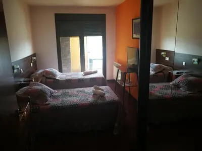 Cama o camas de una habitación en Apartamento rural Escarla 2-2