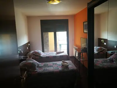 Cama o camas de una habitación en Apartamento rural Escarla 2-2