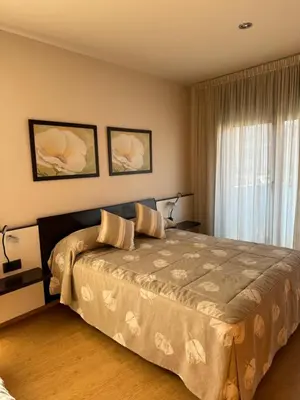 Cama o camas de una habitación en Apartamentos Turísticos Can Rocamora