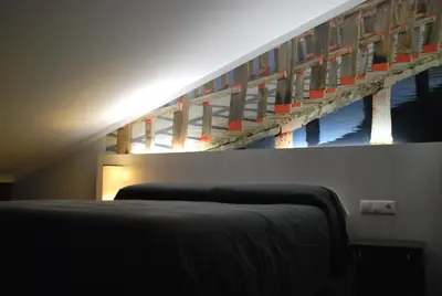 Cama o camas de una habitación en Aparthotel Meseguer