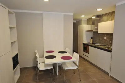 Una cocina o zona de cocina en Aparthotel Meseguer