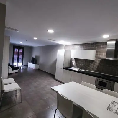 Una cocina o zona de cocina en Aparthotel Meseguer