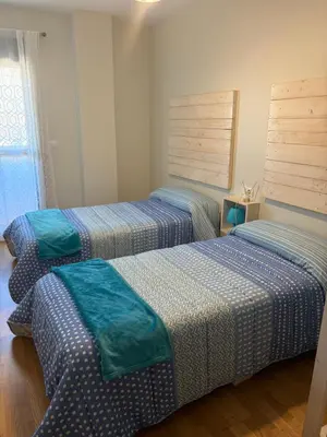 Cama o camas de una habitación en Apartamento Turístico “El Yugo”