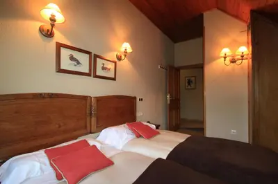 Cama o camas de una habitación en Hotel-Aparthotel El Reyno