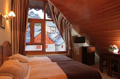 Cama o camas de una habitación en Hotel-Aparthotel El Reyno