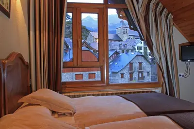 Cama o camas de una habitación en Hotel-Aparthotel El Reyno