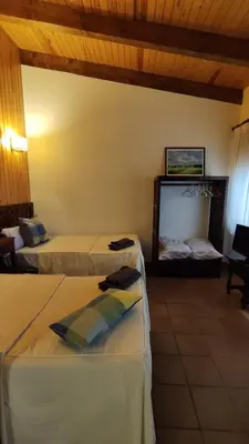 Cama o camas de una habitación en Hostal Escartín