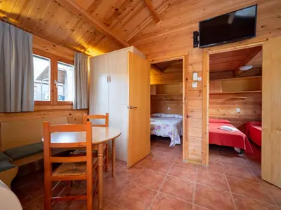 Cama o camas de una habitación en Centro de Vacaciones Morillo de Tou - Ainsa