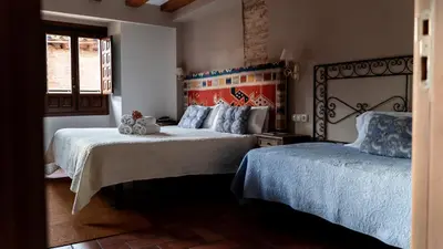 Cama o camas de una habitación en Hotel El Cerco