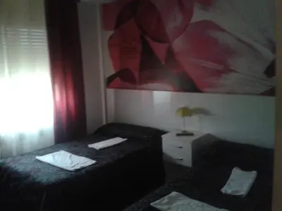 Cama o camas de una habitación en Hostal Texas 2