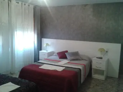 Cama o camas de una habitación en Hostal Texas 2