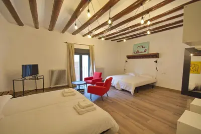 Una televisión o centro de entretenimiento en Pension Casa Pinilla